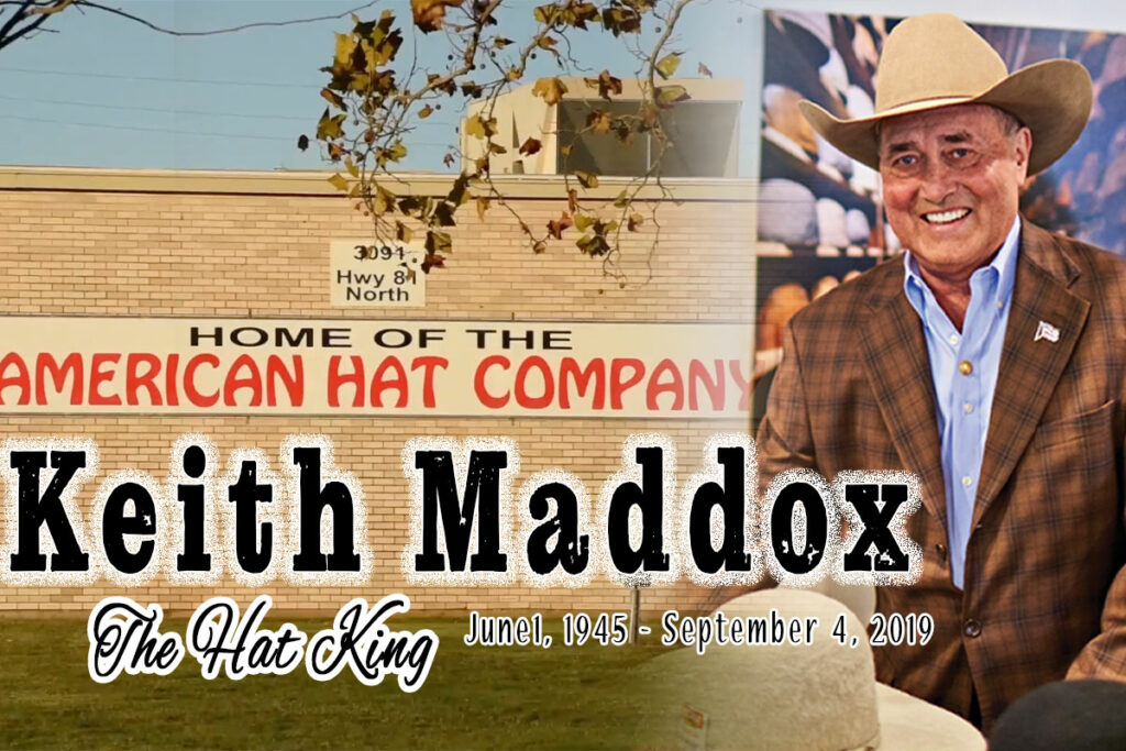 A collage of photos. One photo shows Keith Maddox wearing a brown plaid sports coat over a blue button-up shirt with a tan felt cowboy hat. He is smiling at the camera. The other photo shows the exterior of a tan brick building with a sign that says "Home of the American Hat Company." Overlaid across both photos are the words "Keith Maddox, The Hat King."